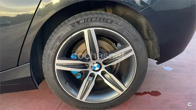Usado BMW 118 Sport Line 143 CV (105 kW) 2012 Negro Utilitario