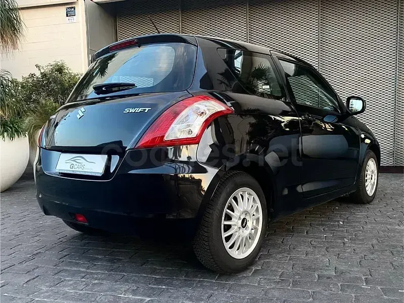 Usado Suzuki Swift GL 95 CV (69 kW) 2011 Negro Utilitario