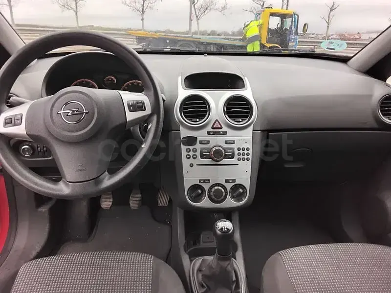 Usado Opel Corsa Essentia 85 HP (62 kW) 2012 Vermelho Citadino