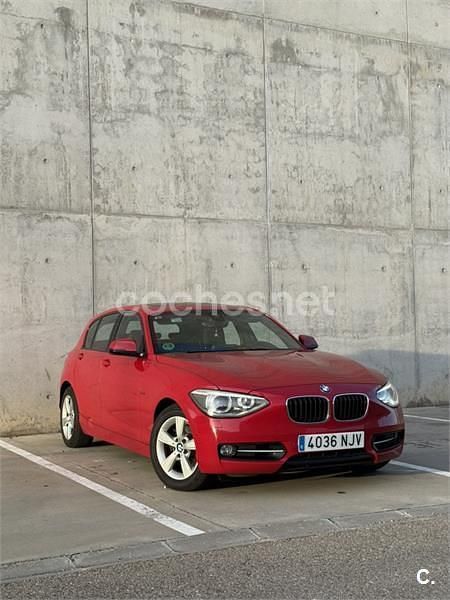 Usado BMW 118 Sport Line 170 CV (125 kW) 2012 Rojo Utilitario