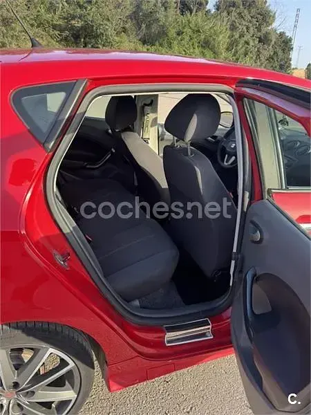 Usado Seat Ibiza Reference 85 CV (62 kW) 2010 Rojo Berlina