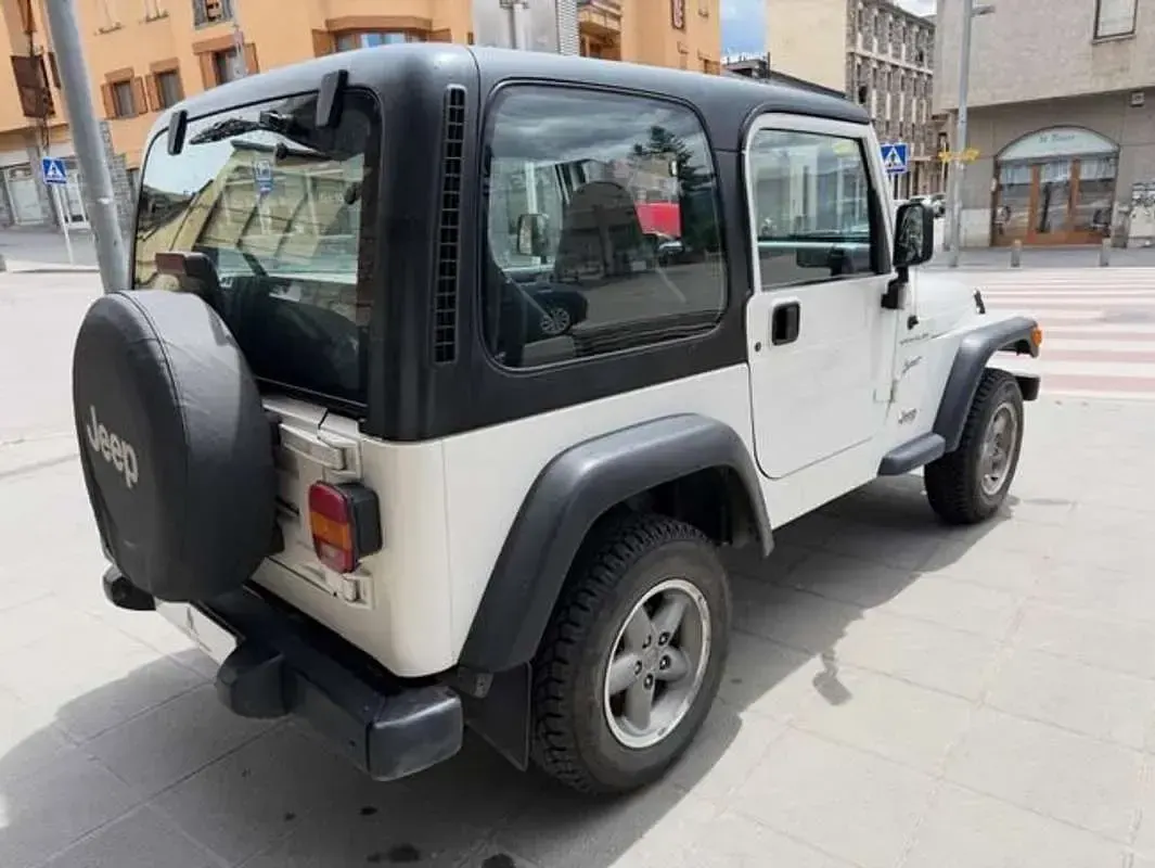 Usado Jeep Wrangler Sport 118 CV (86 kW) 1997 Blanco SUV