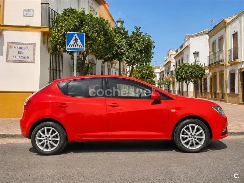 Usado Seat Ibiza Style 110 CV (80 kW) 2016 Naranja Berlina
