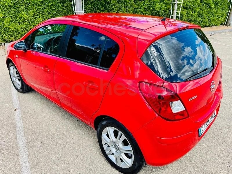 Usado Opel Corsa Selective 95 CV (69 kW) 2013 Rojo Utilitario