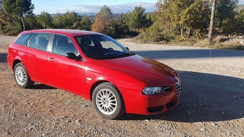 Rojo Usado 2004 Alfa Romeo 156 Distinctive Familiar | 6900 € - Imagen 1/4
