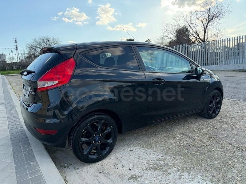 Usado Ford Fiesta Titanium 95 CV (69 kW) 2012 Negro Utilitario