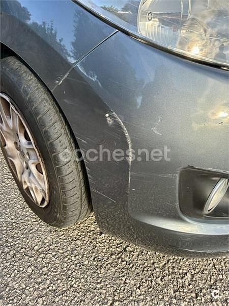 Usado Peugeot 207 Envy 70 CV (51 kW) 2011 Gris / plata Berlina