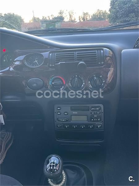 Usado Ford Escort Ghia 90 CV (66 kW) 1997 Verde Berlina