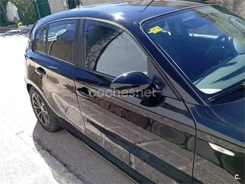 Usado BMW 118 143 CV (105 kW) 2009 Negro Utilitario