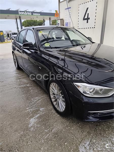 Occasion BMW 318 Luxury Line 143 PK (105 kW) 2012 Zwart Sedan