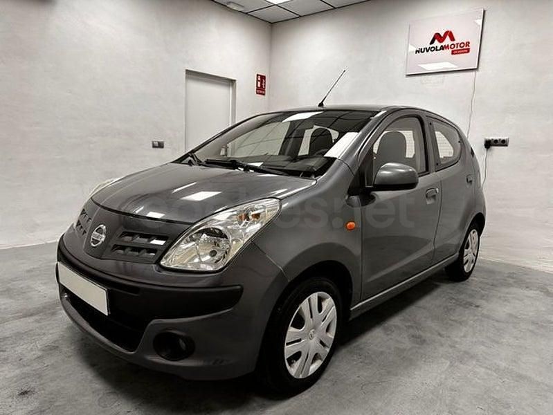 Usado Nissan Pixo Acenta 68 CV (50 kW) 2011 Gris / plata Utilitario