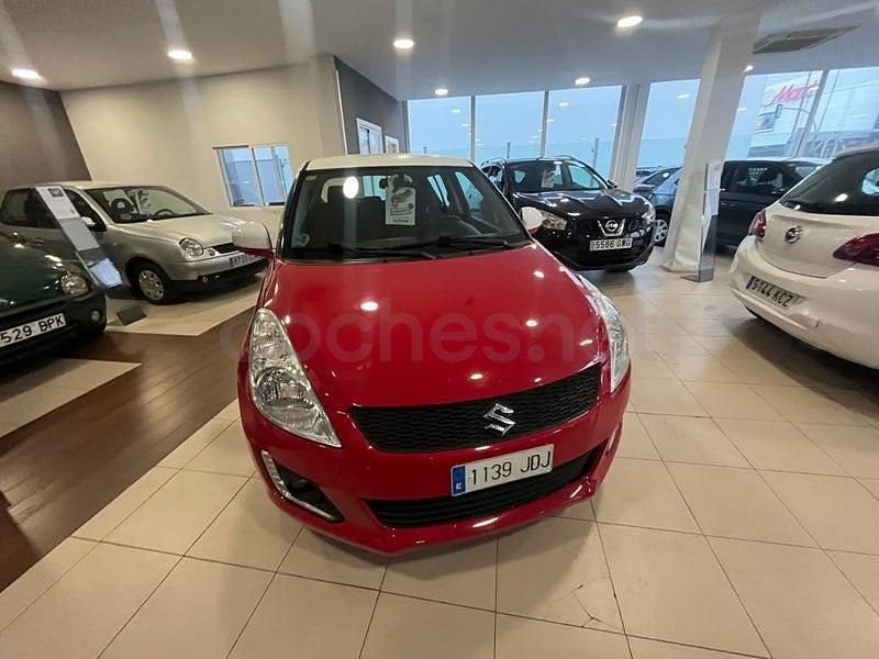 Usado Suzuki Swift 94 CV (69 kW) 2015 Rojo Utilitario