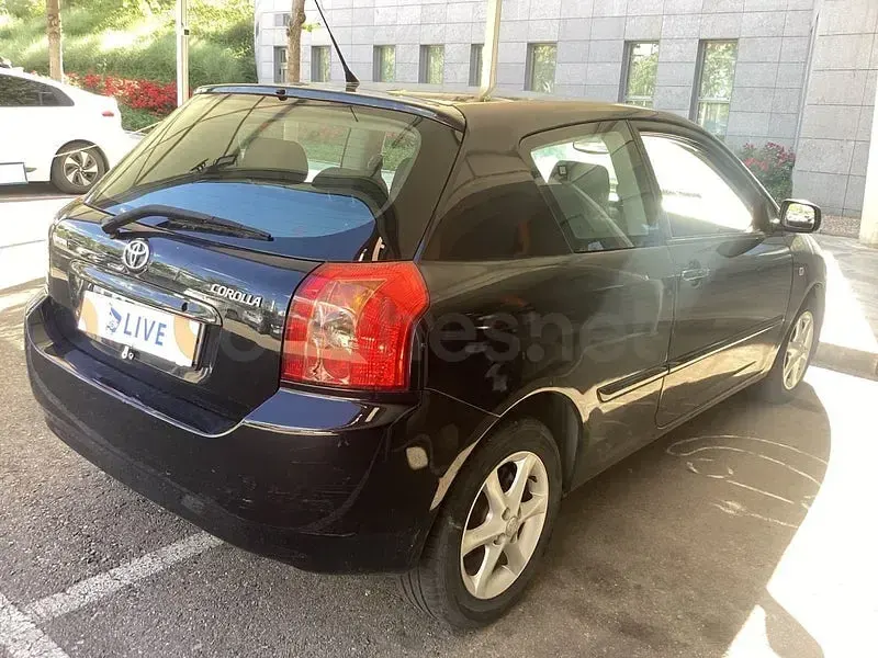 Usado Toyota Corolla Sol 110 CV (80 kW) 2005 Negro Berlina
