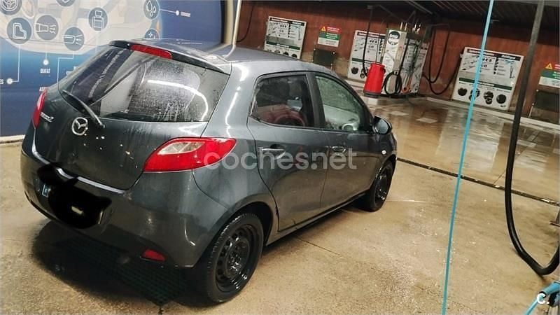 Usado Mazda 2 Active 68 CV (50 kW) 2009 Granate Utilitario