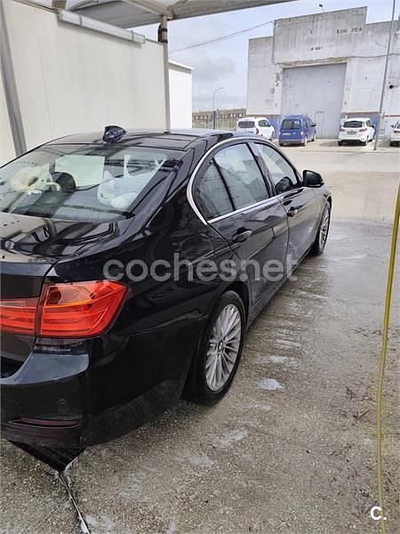 Occasion BMW 318 Luxury Line 143 PK (105 kW) 2012 Zwart Sedan