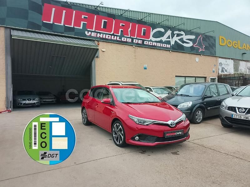 Rojo Usado 2016 Toyota Auris Hybrid Active Berlina | 13.490 € (Precio justo) - Imagen 1/4