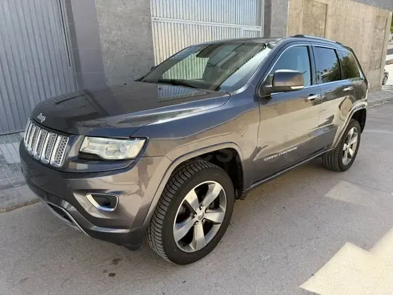 Usado Jeep Grand Cherokee Overland 250 CV (183 kW) 2015 Marrón SUV