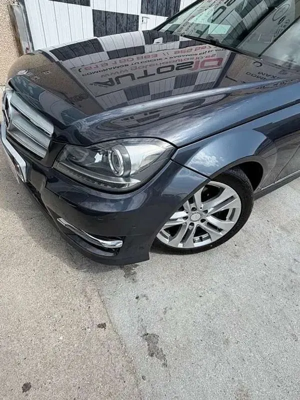 Usado Mercedes C200 136 CV (100 kW) 2013 Gris Berlina
