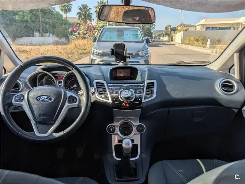 Usado Ford Fiesta Titanium 95 CV (69 kW) 2012 Negro Berlina