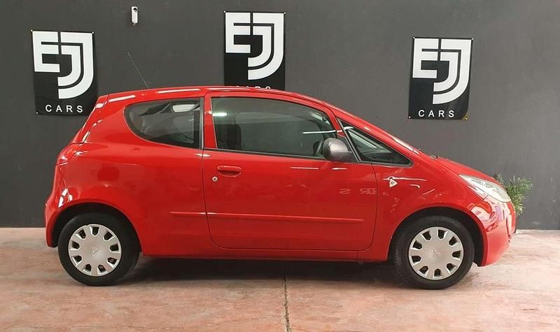 Usado Mitsubishi Colt Inform 75 CV (55 kW) 2008 Rojo Utilitario