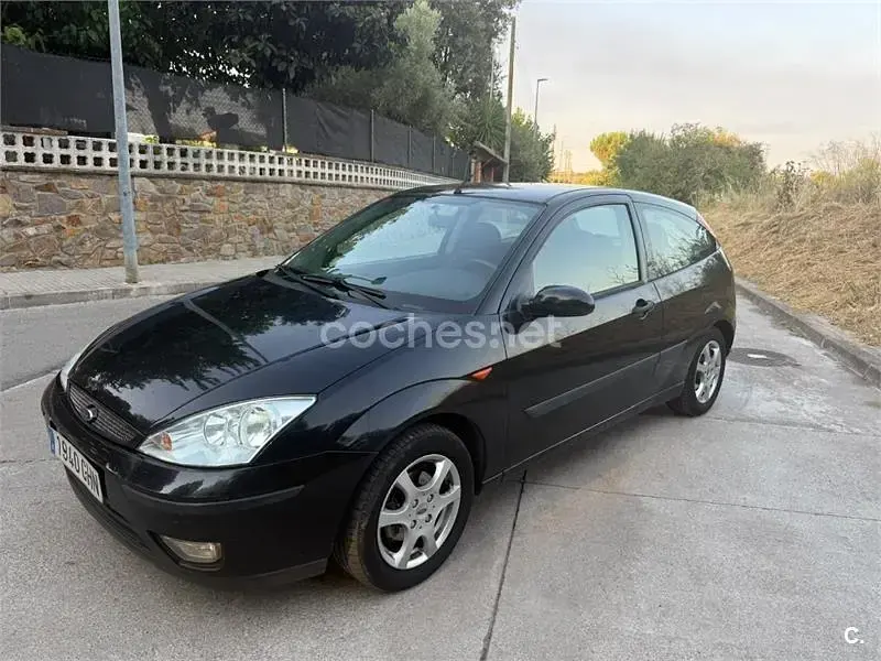 Usado Ford Focus Trend 100 CV (73 kW) 2003 Negro Berlina