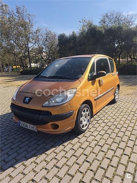 Usado Peugeot 1007 75 CV (55 kW) 2006 Naranja Monovolumen