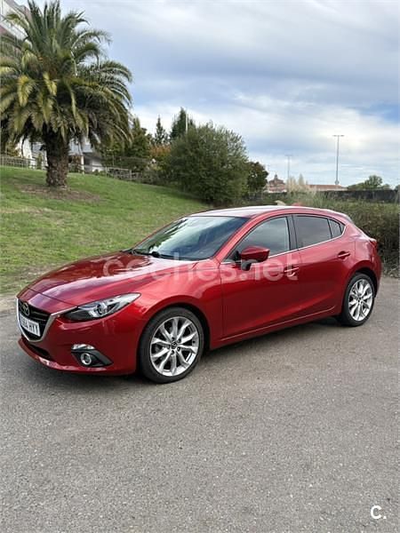 Rojo Usado 2014 Mazda 3 Luxury Berlina | 14.999 € (Un poco caro) - Imagen 1/4