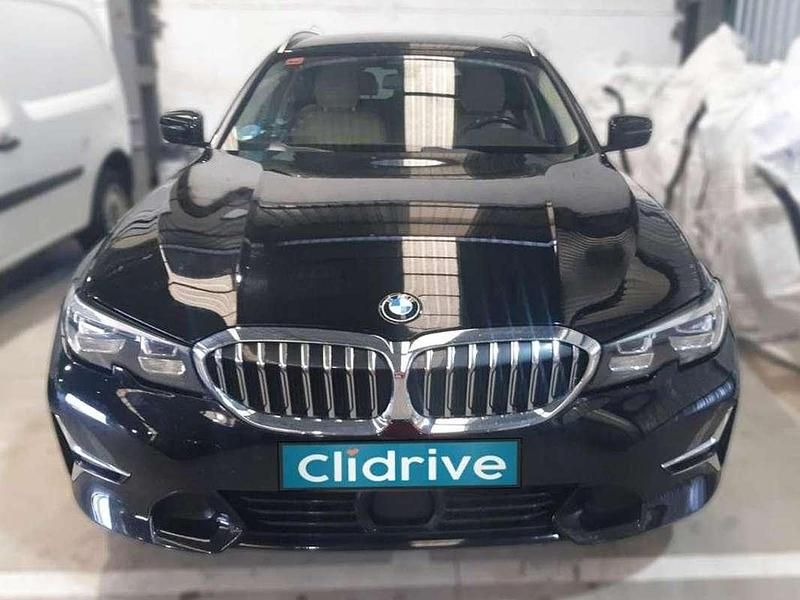 Usado BMW 320 190 CV (139 kW) 2021 Negro Familiar