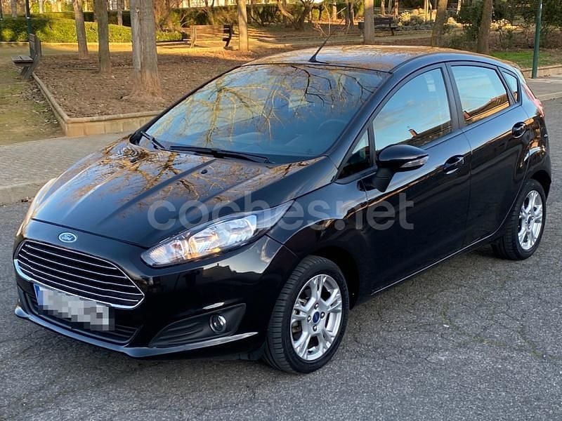 Negro Usado 2014 Ford Fiesta Trend Berlina | 9900 € (Un poco caro) - Imagen 1/4