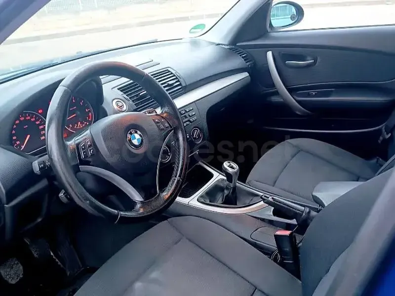Usado BMW 116 122 CV (89 kW) 2007 Azul Utilitario