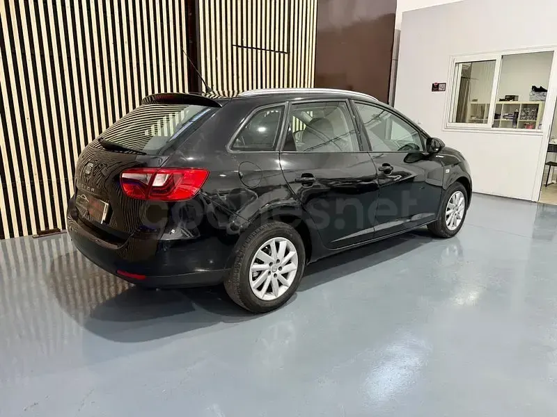 Usado Seat Ibiza ST Reference 90 CV (66 kW) 2014 Negro Familiar