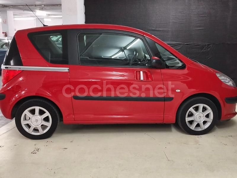 Usado Peugeot 1007 75 CV (55 kW) 2007 Rojo Monovolumen