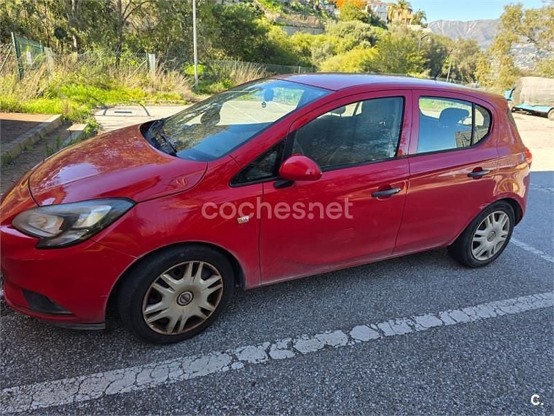 Usado Opel Corsa Expression 75 HP (55 kW) 2015 Vermelho Citadino