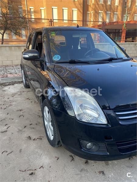 Usado Suzuki Swift GLX 92 CV (67 kW) 2010 Negro Utilitario