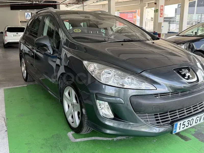 Usado Peugeot 308 SW Premium 110 CV (80 kW) 2010 Gris / plata Familiar