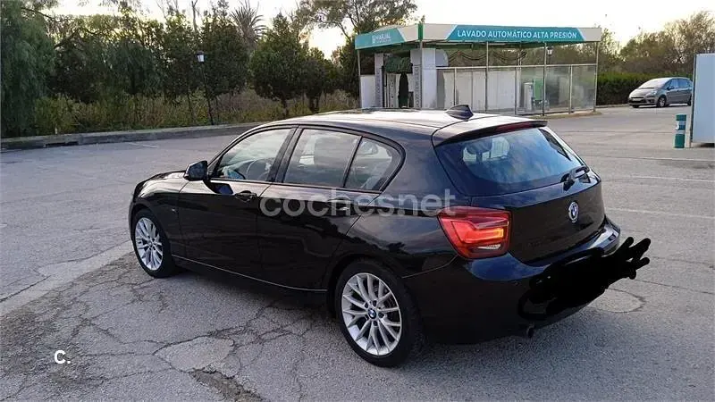 Usado BMW 120 Sport Line 184 CV (135 kW) 2012 Negro Utilitario