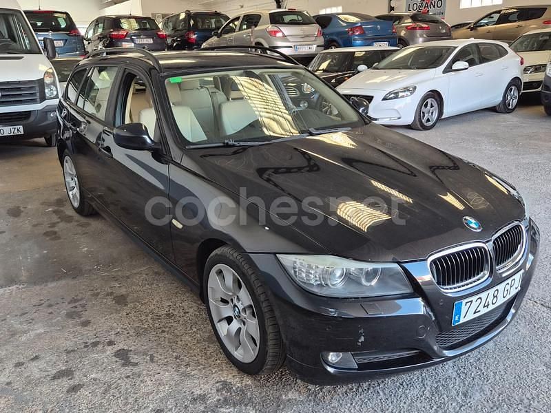 Usado BMW 320 177 CV (130 kW) 2009 Negro Familiar