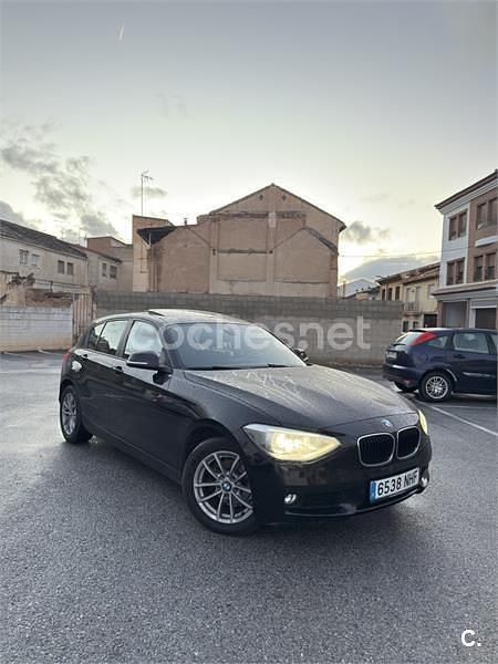 Negro Usado 2013 BMW 118 Efficient Dynamics Utilitario | 11.500 € (Un poco caro) - Imagen 1/4