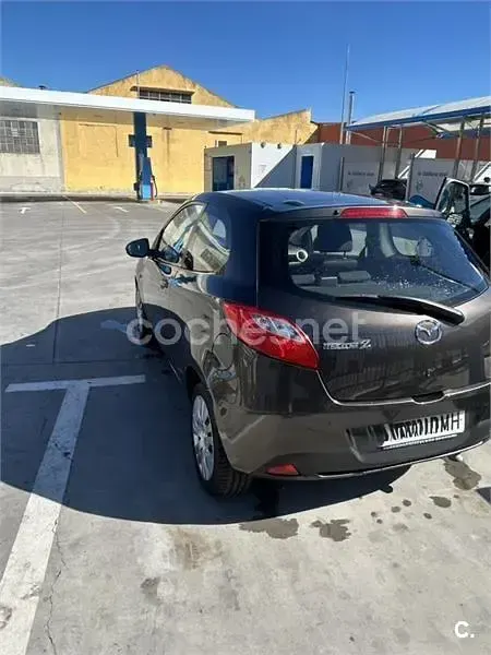 Usado Mazda 2 Active 68 CV (50 kW) 2009 Gris / plata Utilitario