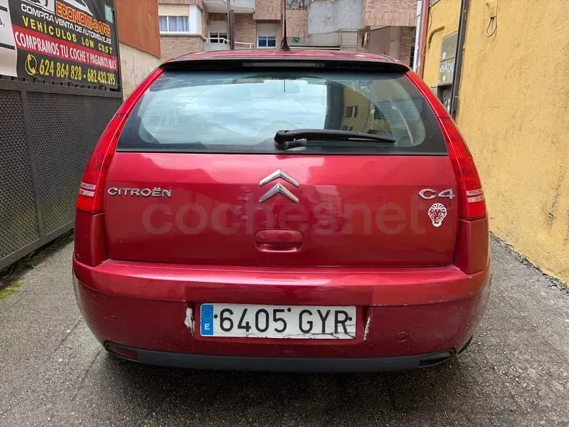 Usado Citroën C4 112 CV (82 kW) 2010 Granate Berlina
