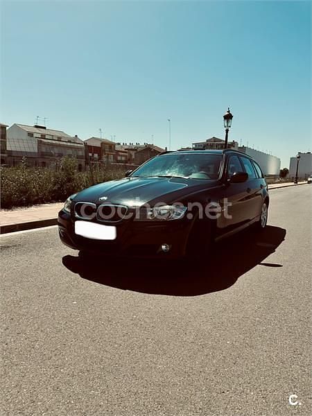 Usado BMW 318 143 CV (105 kW) 2011 Negro Familiar