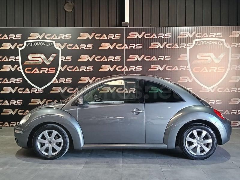 Usado VW New Beetle 105 CV (77 kW) 2008 Gris / plata Utilitario