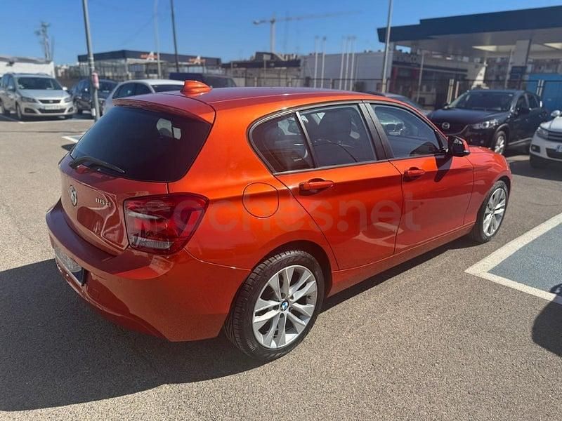 Usado BMW 116 Sport Line 116 CV (85 kW) 2014 Naranja Utilitario