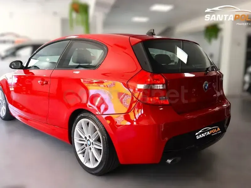 Usado BMW 116 115 CV (84 kW) 2009 Rojo Utilitario