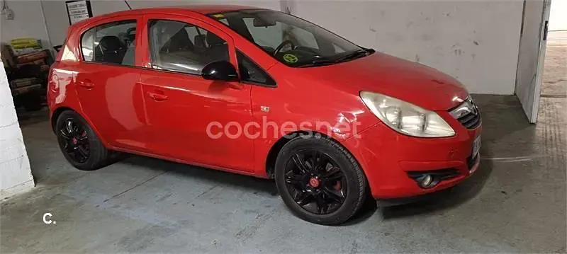 Używany Opel Corsa Cosmo 90 KM (66 kW) 2009 Czerwony Hatchback