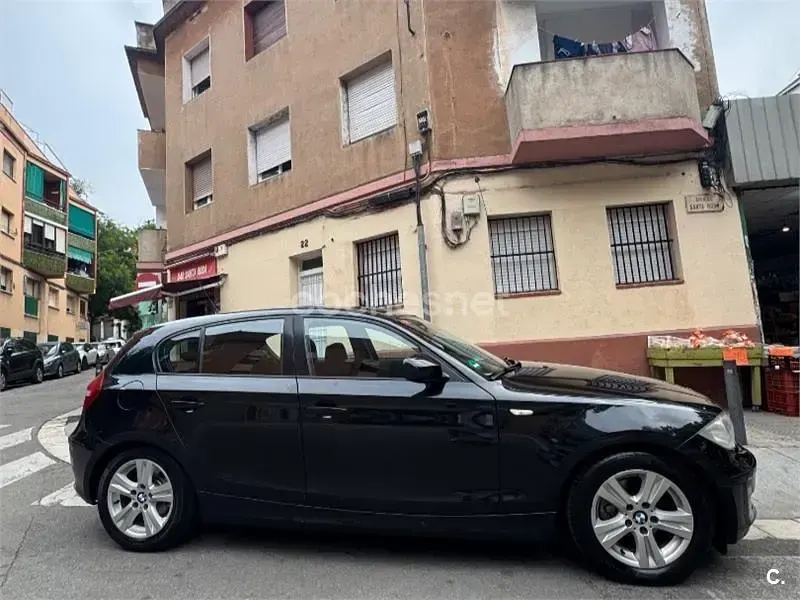 Usado BMW 116 122 CV (89 kW) 2011 Negro Utilitario
