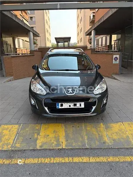 Usado Peugeot 308 SW Sportium 112 CV (82 kW) 2012 Gris / plata Familiar