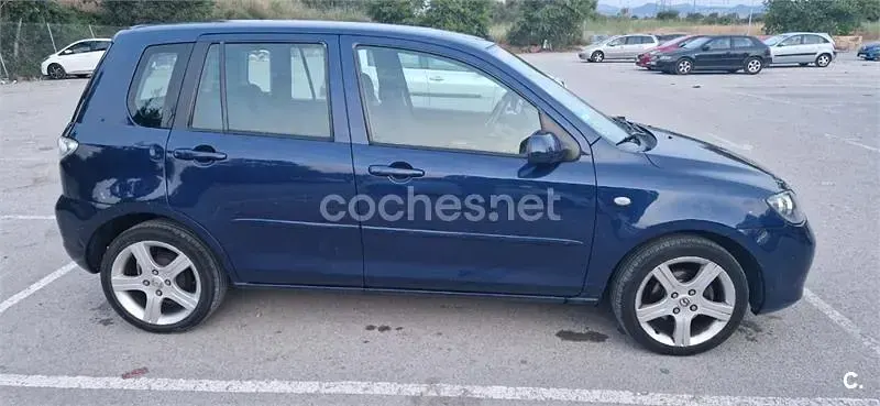 Usado Mazda 2 Active 68 CV (50 kW) 2006 Azul Utilitario