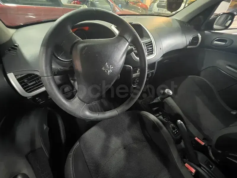 Usado Peugeot 206+ 70 CV (51 kW) 2010 Negro Utilitario