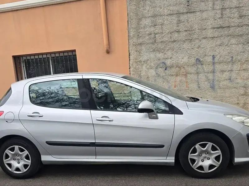 Usado Peugeot 308 120 CV (88 kW) 2009 Gris / plata Berlina